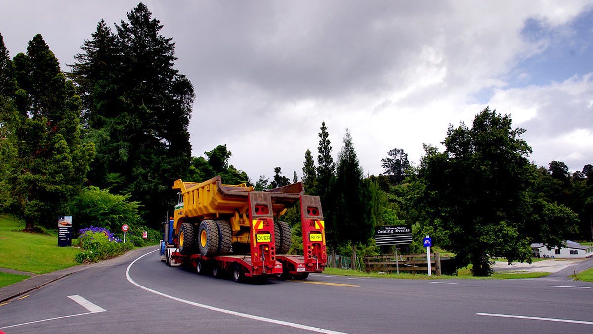 Oversized load with escort on the road
